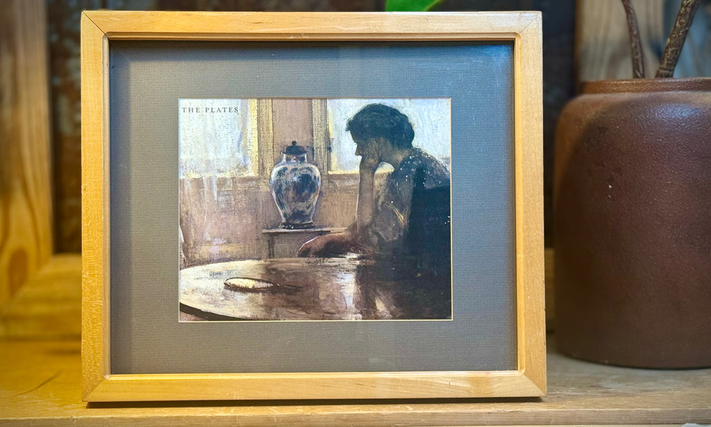 Natural Frame w/ A Print Of A Lady In A Room At A Table